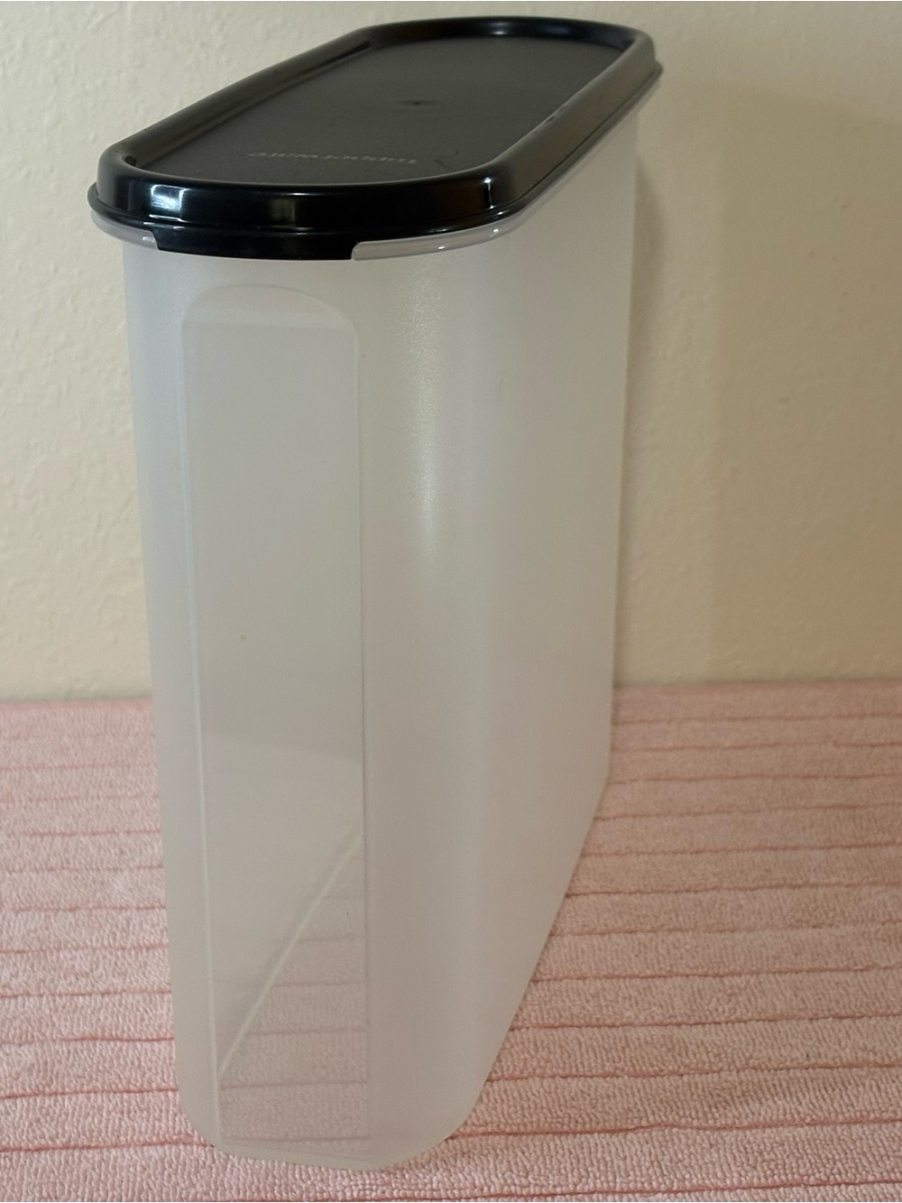 Tupperware Modular
Mates with air tag  Black Lid